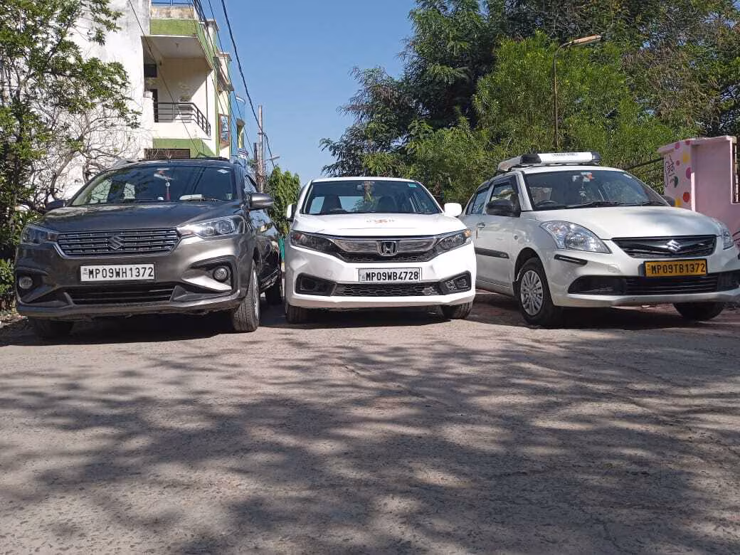 Best Taxi Services in Dewas Best Cab Services near me Khan Travel Agency